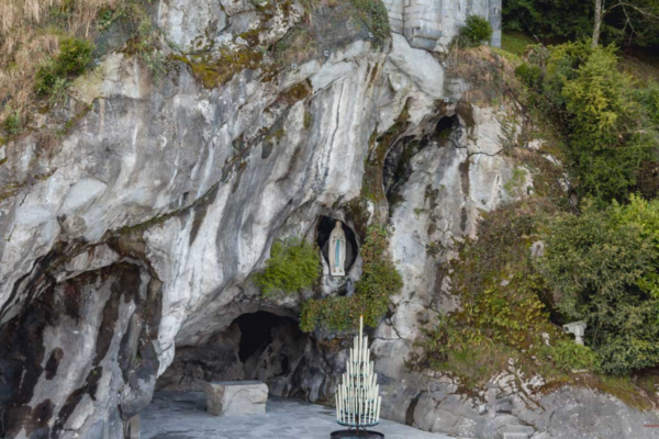 Pray at the Grotto of Massabielle