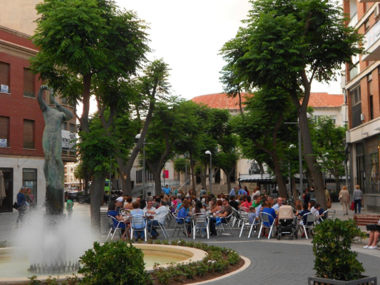 Walk Across Plaza del Pilar